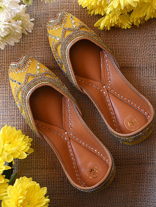 Yellow Hand Embroidered Leather Juttis With Bead Work
