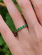 Green Gold Infinity Ring with Emerald